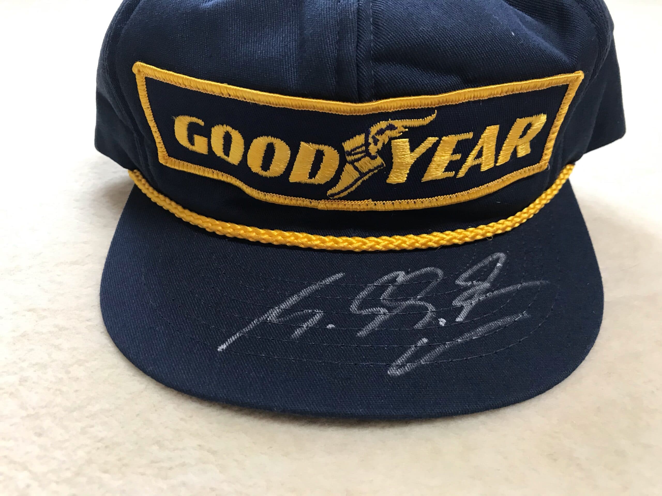 Goodyear podium cap from 1994, hand signed by Michael Schumacher.