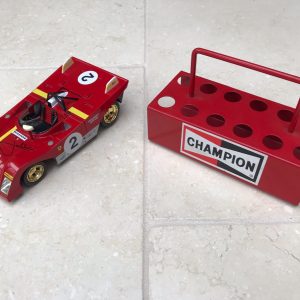 Ferrari / Champion 12x spark plug caddy from the 1970s, with Jacky Ickx hand signed model