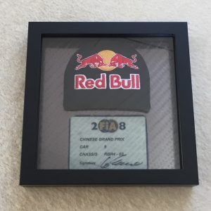 David Coulthard Red Bull RB4 Headrest and Scrutineer Ticket