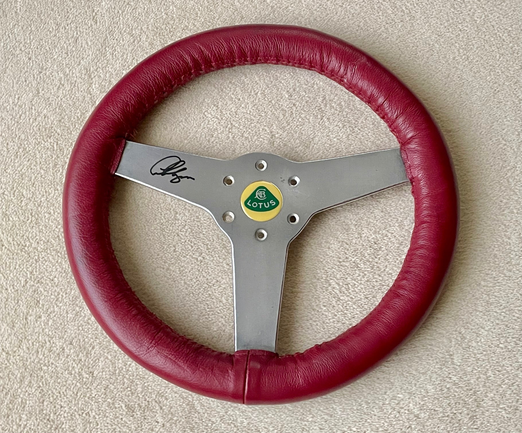 Lotus XI steering wheel signed by Clive Chapman
