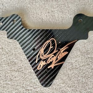 Carbon fibre switch plate hand signed by Mika Hakkinen 'The Flying Finn'