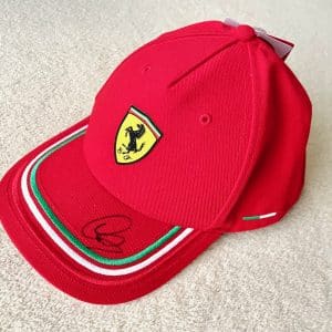 Official Ferrari cap by Puma signed by Lewis Hamilton