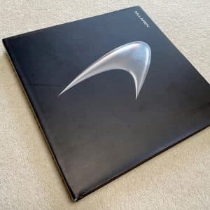 McLaren 'The Wins' hardback signed by Lewis Hamilton and Jenson Button