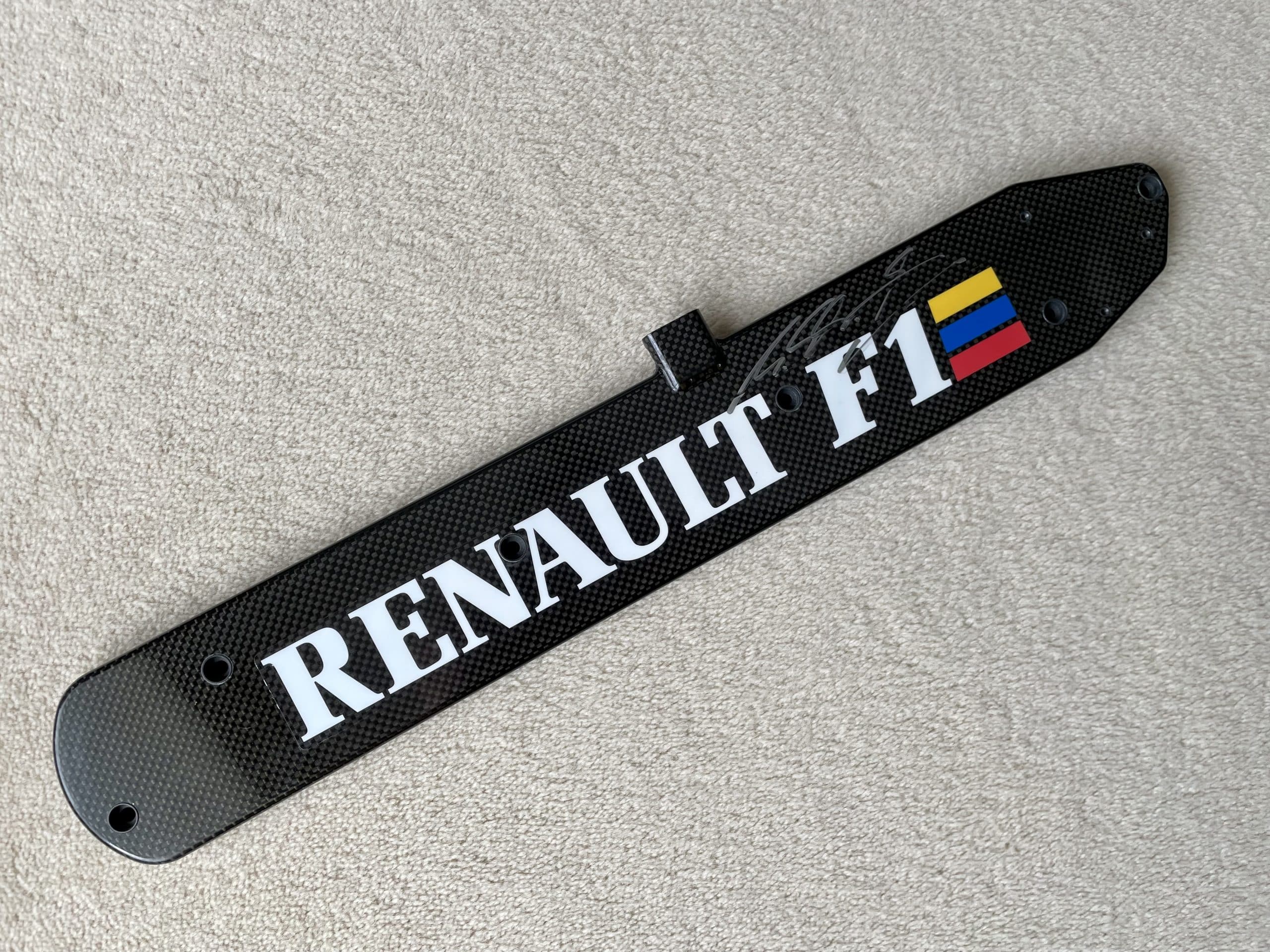 Michael Schumacher signed Renault RS07 carbon coil cover from his 1995 World Championship winning car