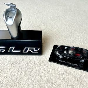 McLaren Mercedes SLR original gear knob / starter display with OE badge and official 1/43 model