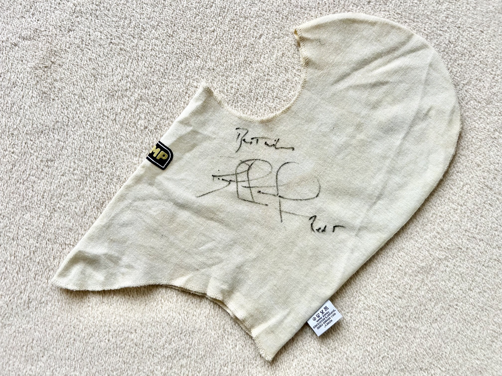 Williams OMP nomex balaclava signed by Nigel Mansell, Damon Hill and David Coulthard
