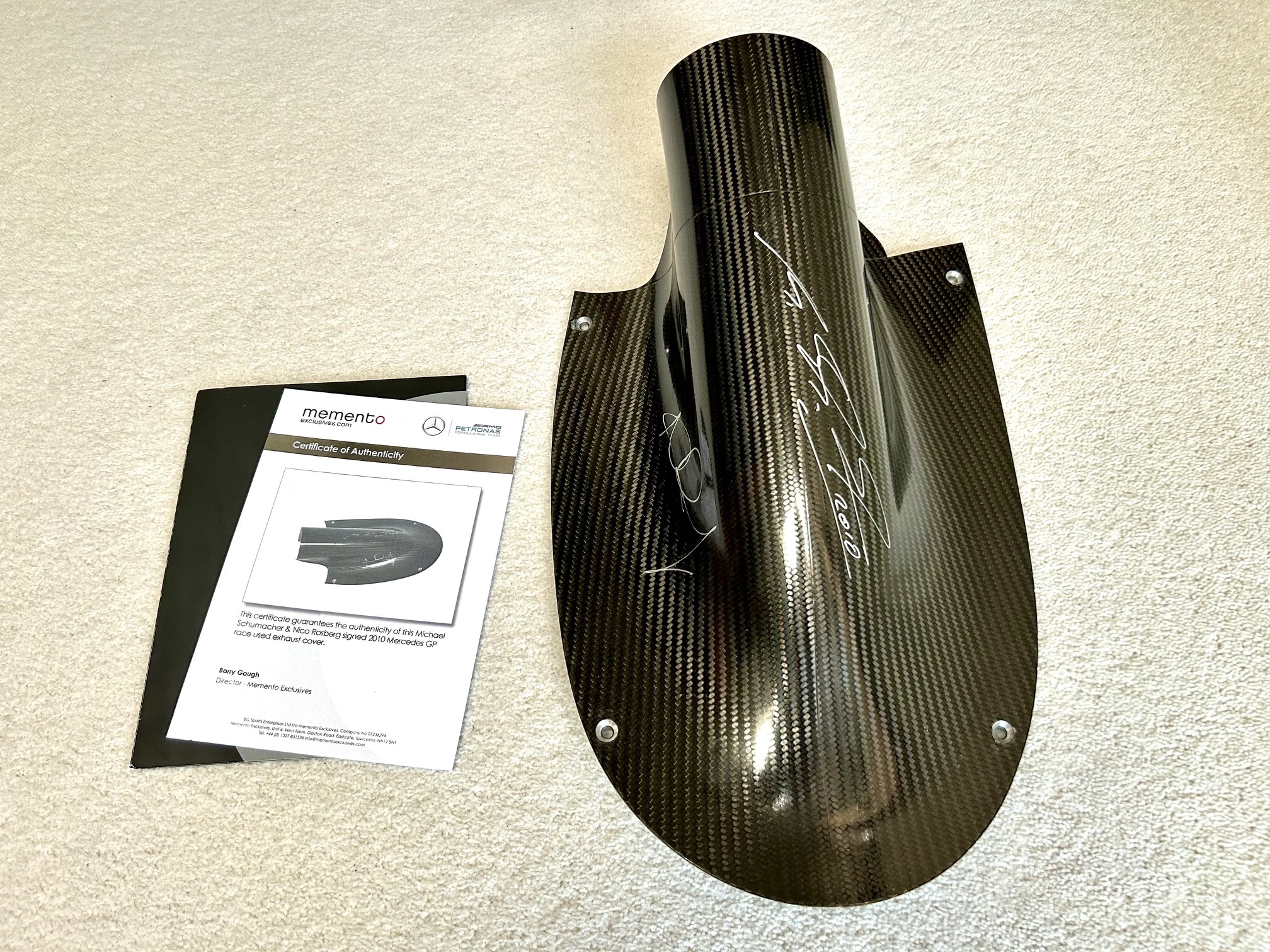 2010 AMG Mercedes GP carbon exhaust shield signed by Michael Schumacher and Nico Rosberg with team COA - Image 5